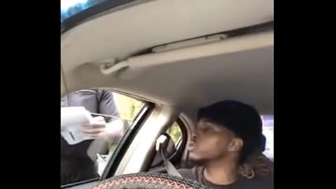 The young gentleman is arguing that he was pulled over because of his skin color