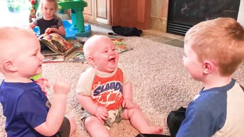 Babies laughing and having fun.