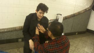 Luodong Briefly Massages Androgynous Person In Subway Station