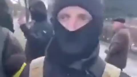 Ukrainian militias roaming the streets committing human rights violations in broad daylight