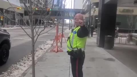 Police arresting bystander for filming their illegal actions