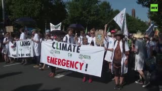 Thousands of climate protesters block highway in The Hague