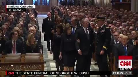 Former President George W. Bush greets current and former presidents at father's funeral