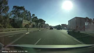 Near Miss for Truck Driver Swerving on Highway