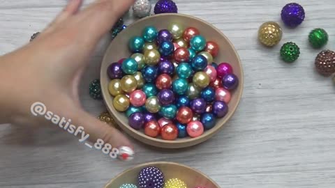 Oddly Satisfying Moments: Beads, Bells, Balls, Bottles, and Stones