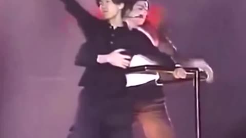 In 1996, during a concert in Seoul, a fan climbed up to Michael Jackson on a crane