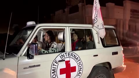 Cheers, whistles as Red Cross transfers hostages in Gaza