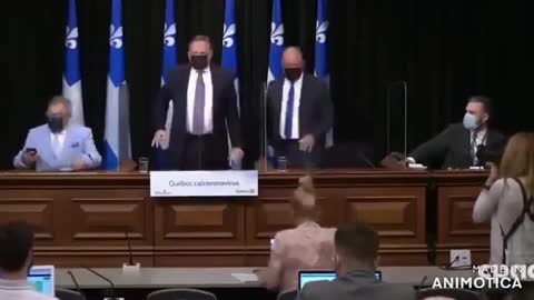 Premier of Quebec flashes the 666 Hand Sign Signal to his Handlers