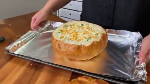 Spinach dip in bread bowl