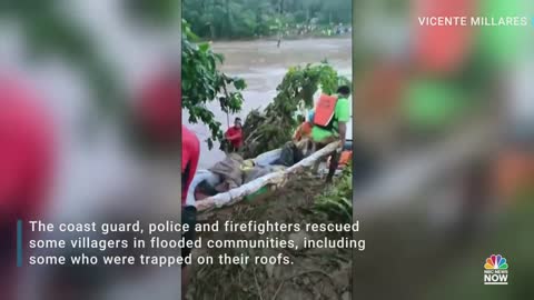 Watch: Rescuers Evacuate People From Floods In Philippines