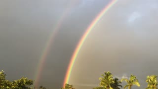 Double Rainbow Stretches across India Sunset