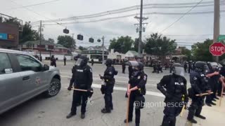 Police are occupying this intersection at Midland and Bardstown