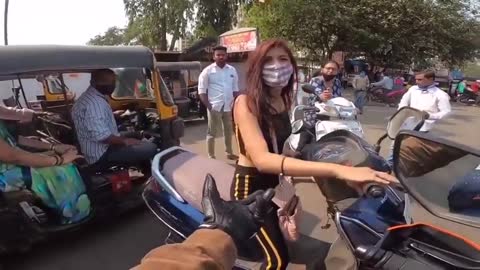 Girl fighting with biker & misusing her rights