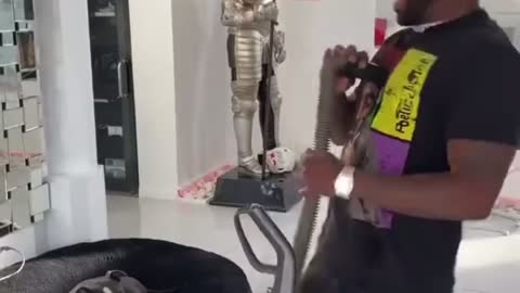 Good boy do a protecc from a vacuum.🐶