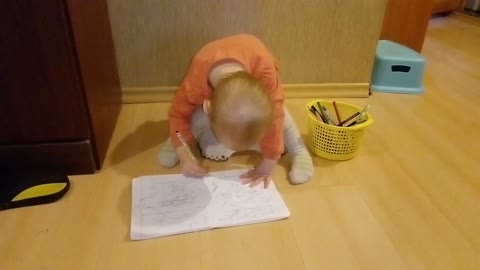 Funny kid doing school homework sitting on a potty.