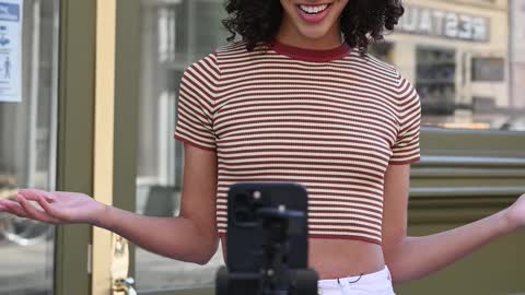 Woman Recording Video Using Cellphone