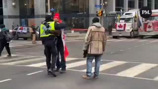 Hugs in Ottawa today, not all cops are bad some support the movement and dont fine the truckers.