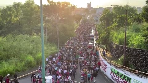 While they have us distracted, a massive caravan is marching to storm our border