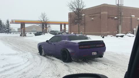 Challenger Sliding Into Gas Station