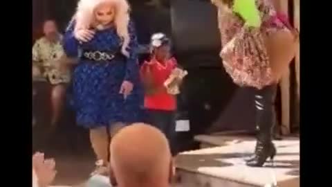 Drag Queen Teaches Child To Dance And Elderly, Disabled Person Throws Money At The Child