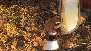 Skillfully Opening A Beer With A Chainsaw