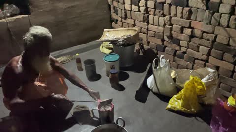 Dayalu Baba Making Tea for Visitors to the Ashram