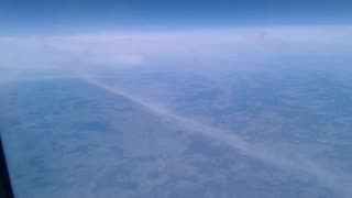 CHEMTRAILS from a PLANE - BELOW and ABOVE CLOUDS