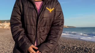 Black Puffer Jacket with Gold Fighting Eagle