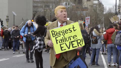 Climate Protestor in Trump Mask