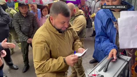 Donetsk People’s Republic head Denis Pushilin votes in the referendum