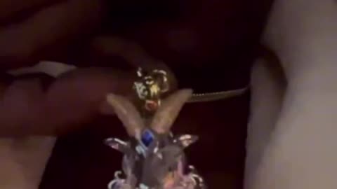 Snoop Dogg brags about his Baphomet pendent.