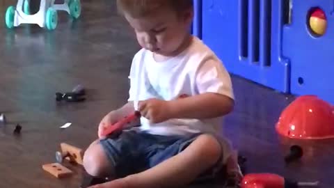 2 year old Learning about tools