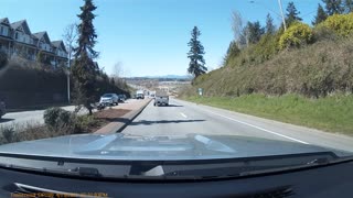 Plywood Flies Out of Truck and Hits Truck in Other Lane