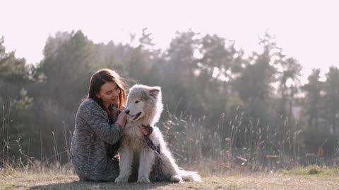 Adorable moment loving warmness with dog