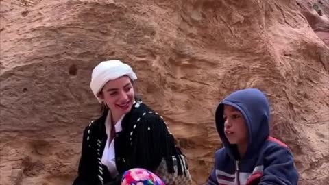 Jordanian boy sings "Dance Monkey" in Petra
