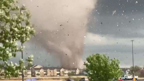A tornado hits a residential area in Andover, Kansas.