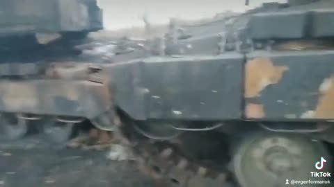 Ukrainian soldiers are saddened by the hit vehicles.