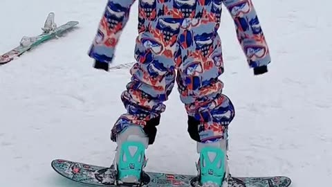 Baby is happy to be skiing