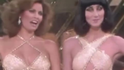 Cher and Raquel Welch singing “I’m a Woman”