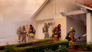 Moment Firefighters Battle Huge House Blaze In California