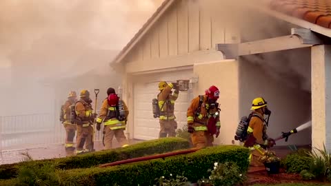 Moment Firefighters Battle Huge House Blaze In California