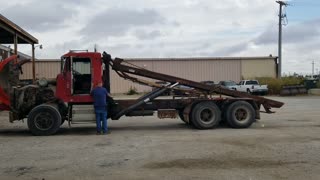 #1219 1988 Kenworth Rolloff