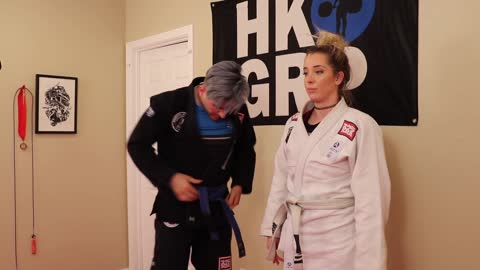 Boyfriend teaches girlfriend basic jiu jitsu techniques 2
