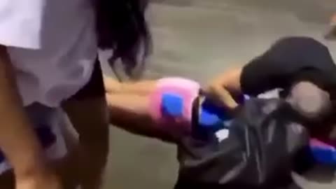 Man shields his Woman at airport