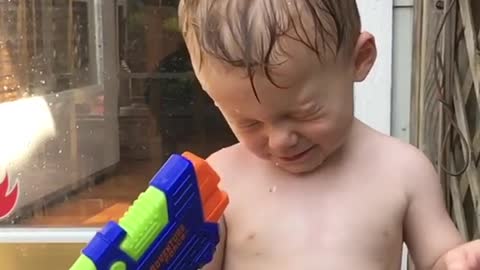 Collab copyright protection - kid shoots water gun into eye