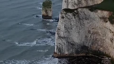 They made their way in single file along the cliff path.