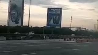 Billboard advertisements along the interstate in the Philippines