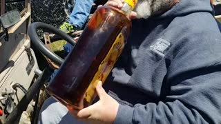 Man Swigs From Massive Fireball Bottle