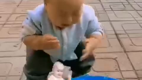 Cute baby and fish