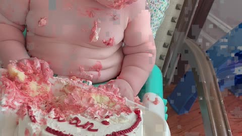 Infant Nods Off During Birthday Cake Feast